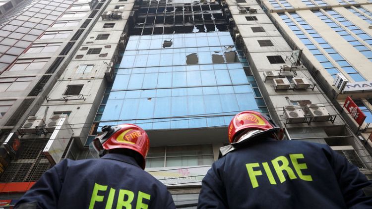 Bangladesh high-rise hit by deadly blaze lacked proper fire exits, official says