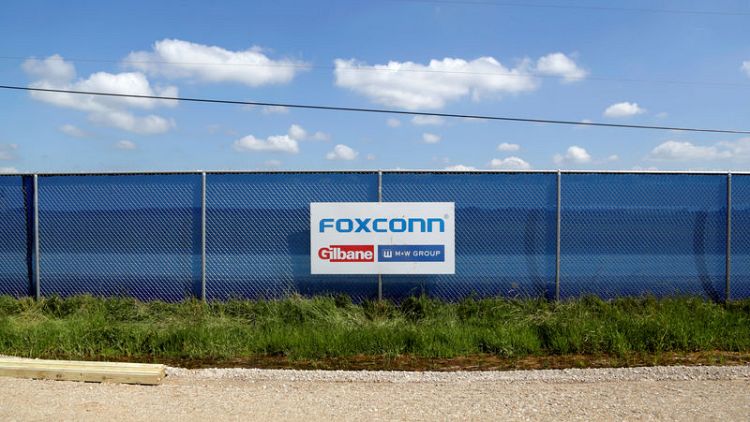 Foxconn posts fall in fourth-quarter profit, beating estimates