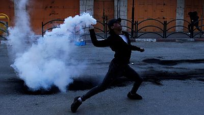 Palestinians injured in protests at Gaza border ahead of anniversary rally Palestinians injured in protests at Gaza border ahead of anniversary rally
