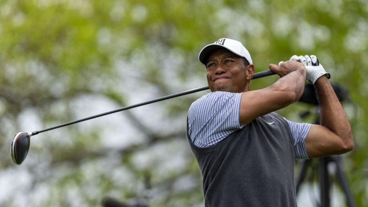 Woods and McIlroy win in Match Play, set up Saturday meeting
