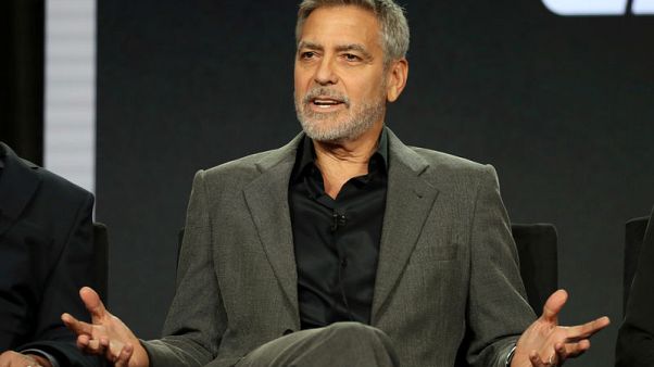 George Clooney urges boycott of Brunei-owned hotels over nation's gay sex penalties George Clooney urges boycott of Brunei-owned hotels over nation's gay sex penalties