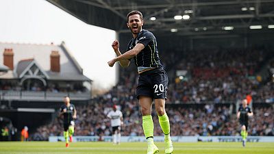 Man City go top again with 2-0 win over misfiring Fulham Man City go top again with 2-0 win over misfiring Fulham