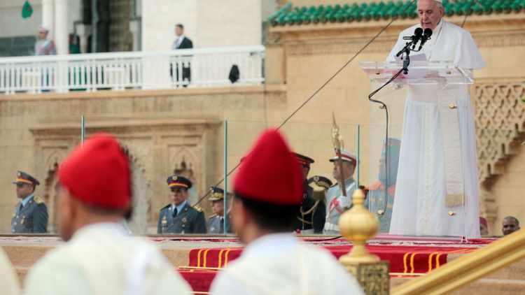 Pope in Morocco says physical barriers won't solve migration issue