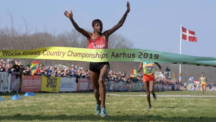 Athletics - Obiri achieves historic world treble at cross country
