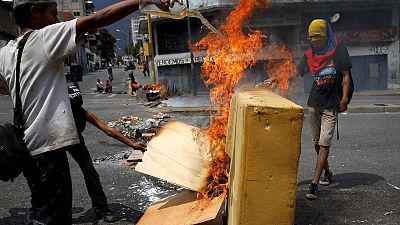 Venezuelans stage scattered protests over lack of power, water Venezuelans stage scattered protests over lack of power, water