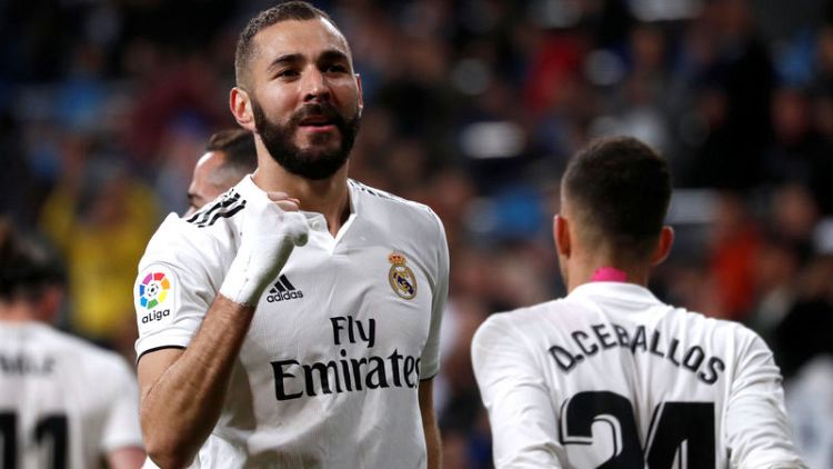 Benzema strikes late to give unconvincing Madrid win over Huesca