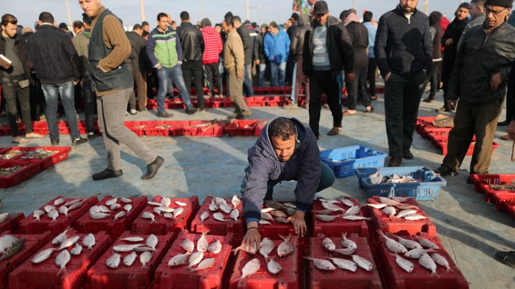 Palestinians pray for fish as Israel opens deeper waters