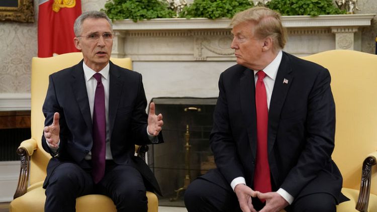 Trump says NATO countries burden-sharing improving, wants more