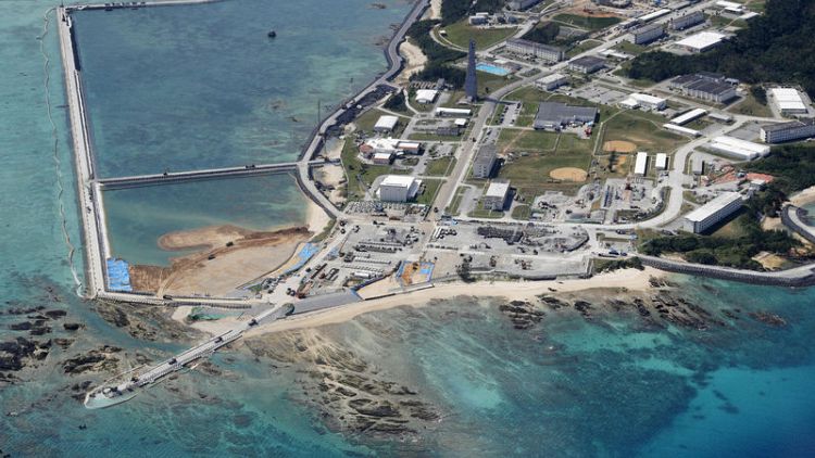 Outnumbered and elderly, Okinawa protesters oppose U.S. military runway
