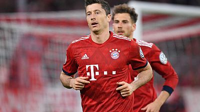 Lewandowski double helps 10-man Bayern edge cup thriller 5-4 Lewandowski double helps 10-man Bayern edge cup thriller 5-4