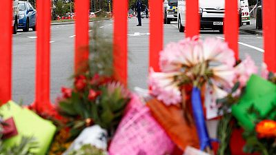 Australian arrested over New Zealand shooting massacre to face 50 murder charges - police Australian arrested over New Zealand shooting massacre to face 50 murder charges - police