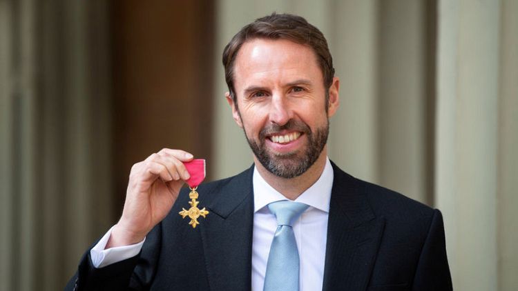 England soccer manager Southgate honoured at Buckingham Palace