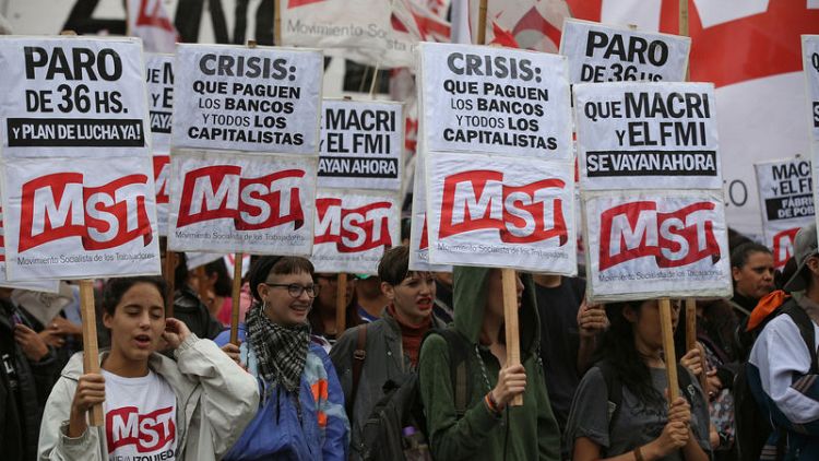 Argentine unions, workers stage rainy pushback against austerity measures