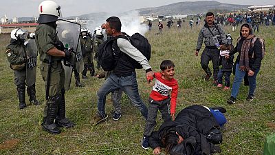 Greek police fire tear gas at migrants as border convoy grows Greek police fire tear gas at migrants as border convoy grows
