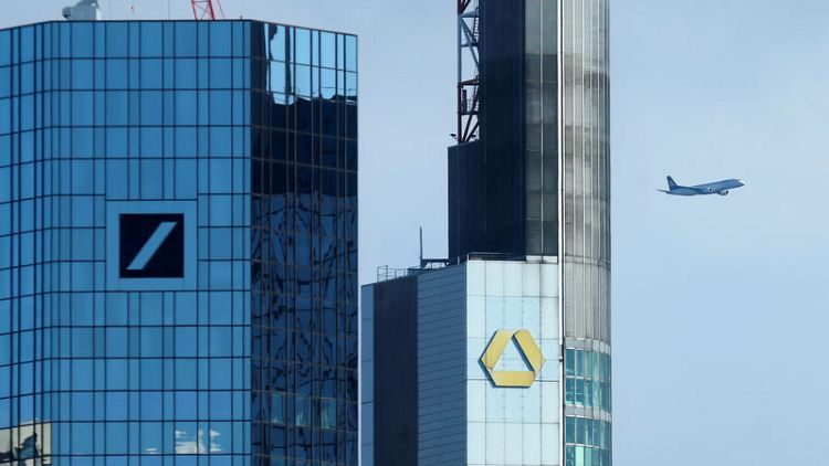 Deutsche, Commerzbank favour merger over holding company structure - sources