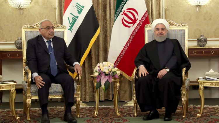 روحاني يقول إيران مستعدة لتوسيع تجارة الطاقة والغاز مع العراق