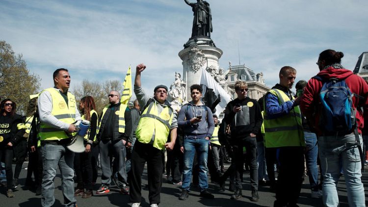 French 'yellow vest' protests largely peacefully as Macron wraps up debate