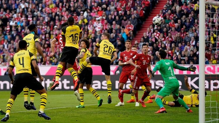 Bayern cinquina e primato, Dortmund ko
