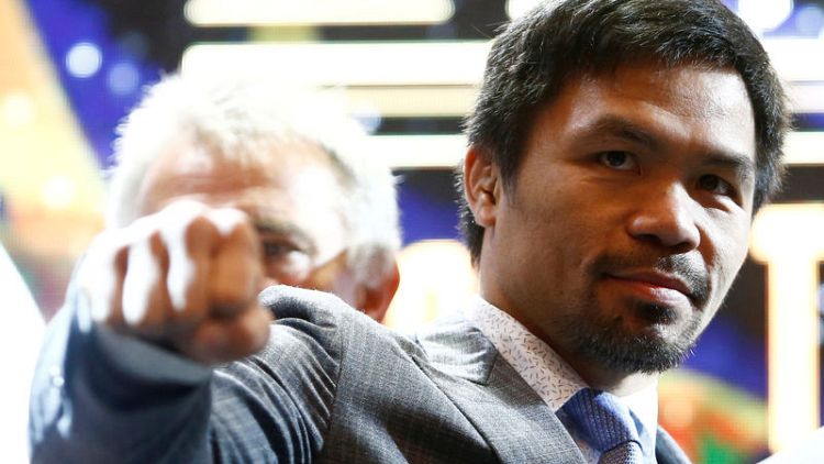 Boxing - Pacquiao follows Mayweather in signing with Japan's Rizin
