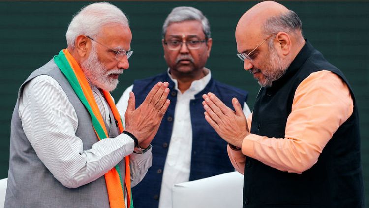 India's Modi-led alliance closes in on majority, survey shows ahead of vote