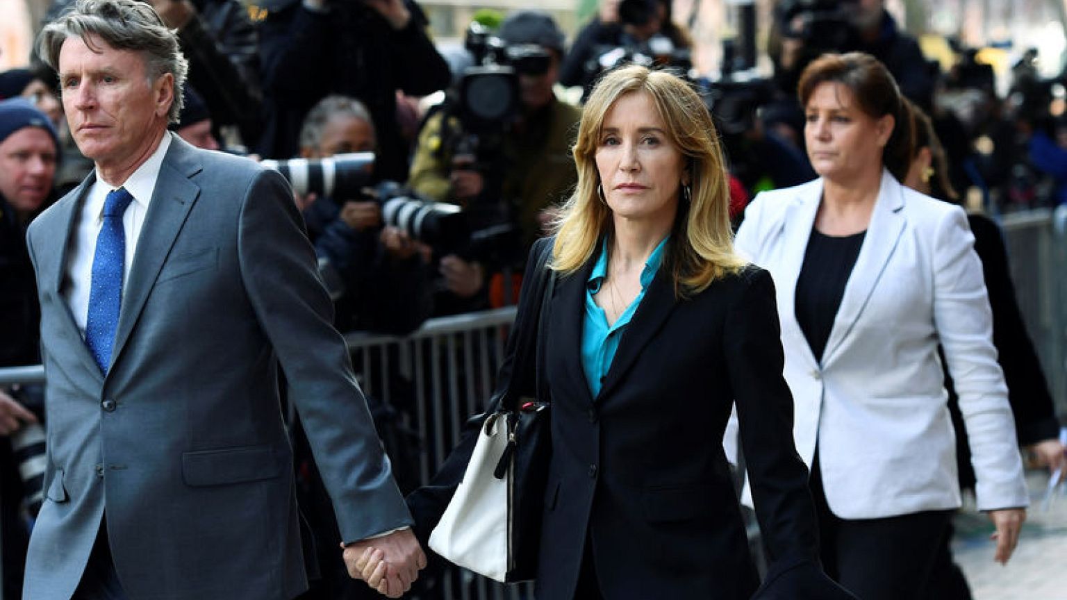 Actress Felicity Huffman, 13 others to plead guilty in U.S. college admissions scandal