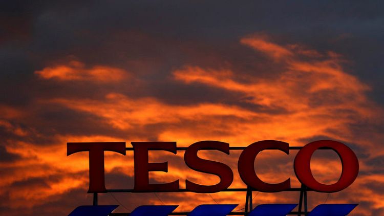 Tesco recovery on track as full-year profit rises 34 percent