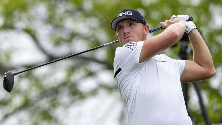 Golf - Par-3 winner Wallace topples old guard, sinks hole-in-one