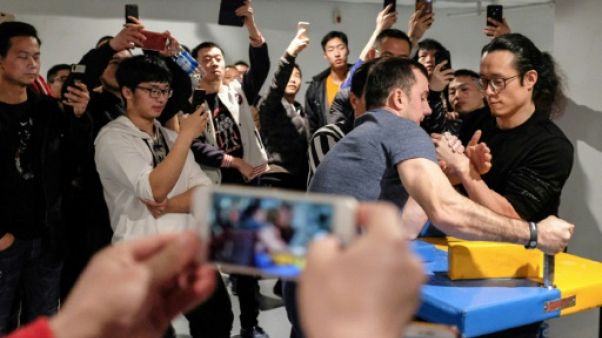 En Chine, le bras-de-fer attend ses lettres de noblesse En Chine, le bras-de-fer attend ses lettres de noblesse