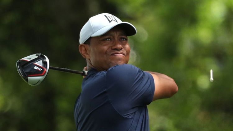 Tiger starts strong, one back of early Masters co-leaders