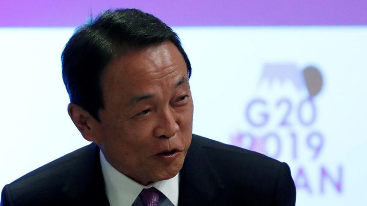 Japan urged G20 to strengthen global coordination - finance minister Aso