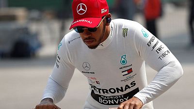 Motor racing - Hamilton baffled by his car's behaviour Motor racing - Hamilton baffled by his car's behaviour