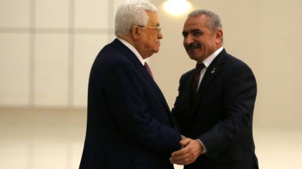 Nouveau gouvernement palestinien, dominé par les fidèles d'Abbas Nouveau gouvernement palestinien, dominé par les fidèles d'Abbas