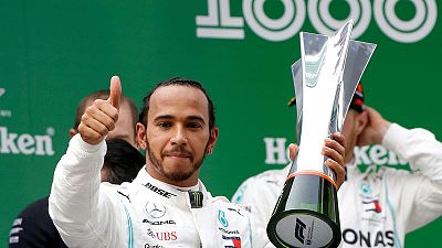 Hamilton wins Formula One's 1,000th race Hamilton wins Formula One's 1,000th race