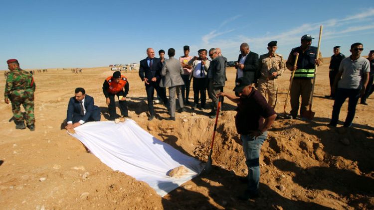 Iraq unearths mass grave of Kurds killed by Saddam