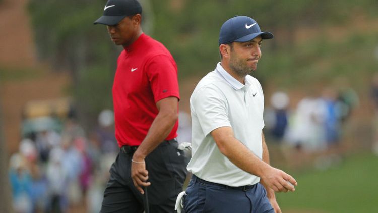 Woods and Molinari set for back-nine Masters showdown
