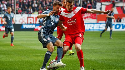 Bayern ease past Duesseldorf 4-1 to reclaim top spot Bayern ease past Duesseldorf 4-1 to reclaim top spot