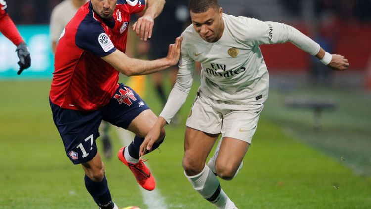 Ten-man PSG humiliated at Lille, made to wait for title