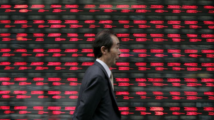 Asia stocks hover below nine-month high after Wall Street stalls