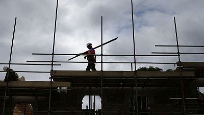 Galliford to review construction business, lowers forecast