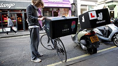 EU lawmakers okay minimum rights for gig economy workers EU lawmakers okay minimum rights for gig economy workers