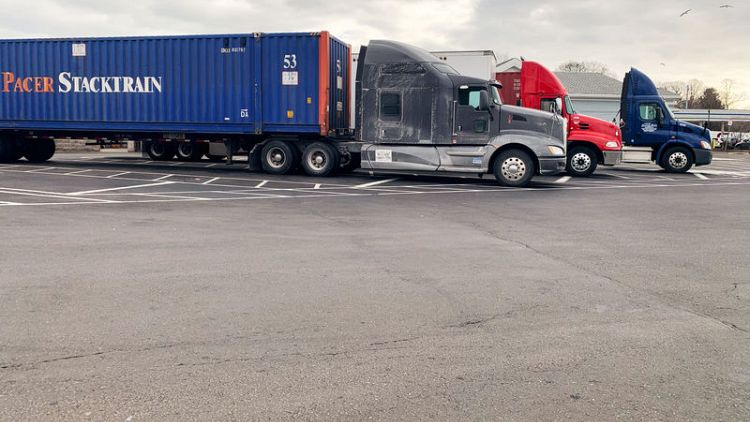 Truck drivers see orders, miles fall in latest U.S. slowdown signal
