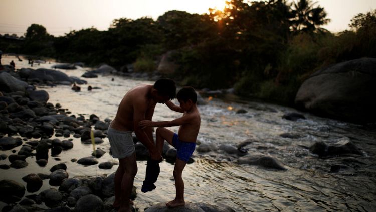 Migrant camps overflow as Mexico cracks down after Trump threats