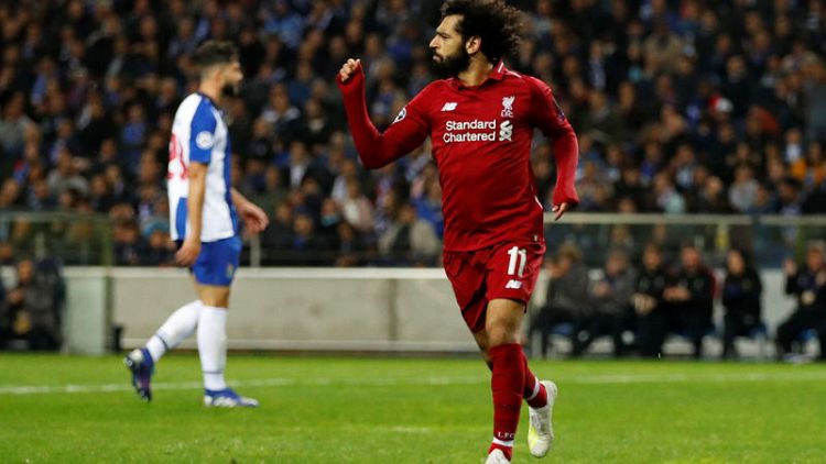 Salah shines as clinical Liverpool see off Porto