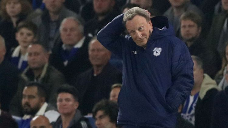 Cardiff's Warnock hopes to avoid thrashing by Liverpool