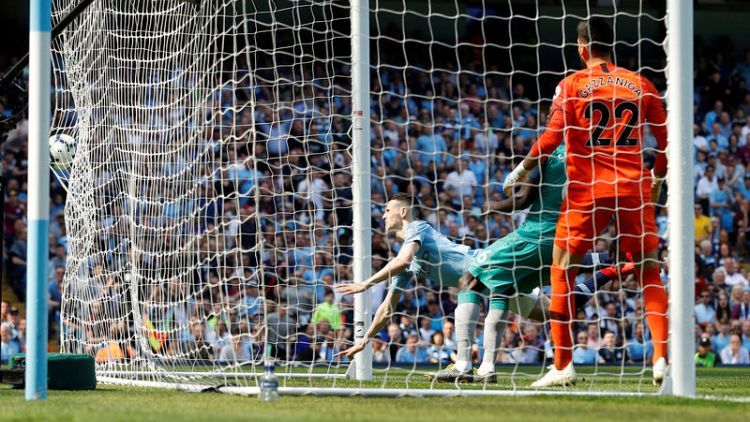 City back on top after tense win over Spurs