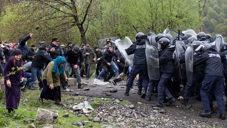 Police in Georgia clash with protesters against hydro plant
