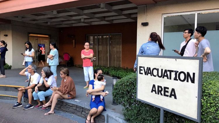 Eight killed, dozens feared trapped after earthquake hits Philippines