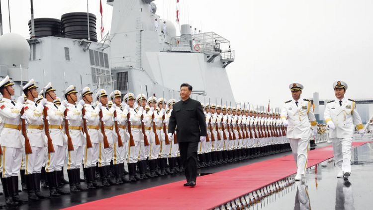 China shows off new destroyer as Xi views naval parade