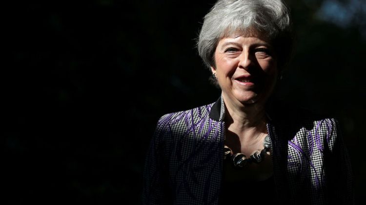 UK's May assures Ukraine's new president of continued support
