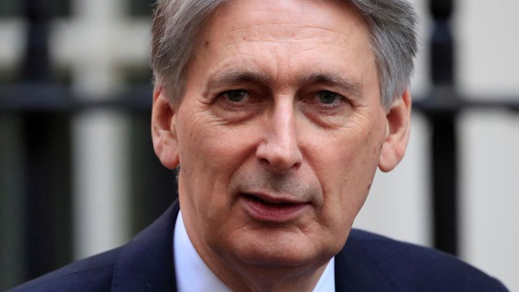 Hammond misses his budget target, even as deficit falls to 17-year low
